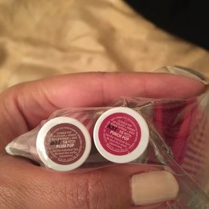Clinique lip sticks and mini bag